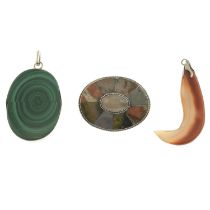 Two hardstone pendants and an agate brooch.