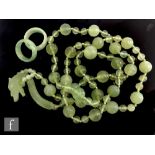 A Chinese green glass faux jade bead necklace, the knotted beads with twenty five large beads,