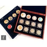 Sixteen Elizabeth II 2007 gilt one dollar Royal enamelled coins, a Jersey poppy crown in blue