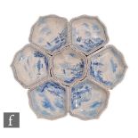 A late 19th to early 20th Century Dutch Delft hor d'oeuvres dish, the central dish formed as a