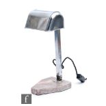 An Art Deco chrome adjustable reading lamp signed Artisian At Francais, on marble base, extended