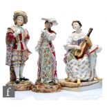 An early 20th Century Dresden type figure modelled as a seated lady playing a guitar with sheet