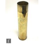 A World War One trench art brass shell case engraved with a floral spray dated 1914-1917, height