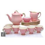 A 1950s Royal Winton Petunia pattern teaset comprising teapot, milk jug, sugar bowl and six tea cups