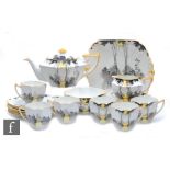 A 1930s Art Deco Shelley Queen Anne shape teaset decorated in the Sunshine and Tall Trees pattern