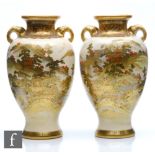 A pair of Japanese Satsuma vases, Meiji Period (1868-1912), each of ovoid form rising to a flared