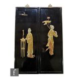 A pair of early 20th Century Japanese black lacquered wall panels, each of rectangular form with