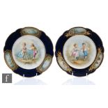 Two early 20th Century Sevres cabinet plates each decorated with children skipping and playing