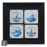 Four 5 inch Delft plastic clay tiles, each decorated in blue and white with scenes of fisherfolk,
