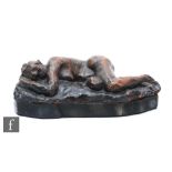 A 20th Century bronzed terracotta figure of a sleeping female, titled Janet Sleeping, width 32cm.