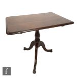 A Victorian mahogany tilt top pedestal table, the rectangular top over a tripod base, height 70cm