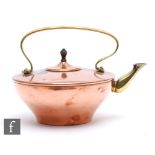 An early 20th Century Arts & Crafts copper tea kettle by W.A.S Benson, mounted with a brass handle