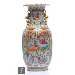 A Chinese 19th Century Canton famille rose vase of rounded ovoid form, rising to a flared neck