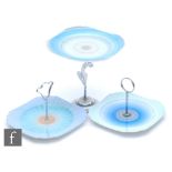 Three 1930s Art Deco Shelley Harmony Ware cake stands, the first in blue and grey bands raised to