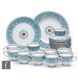Ten Wedgwood Florentine Turquoise teacups, saucers and side plates together with three 20cm