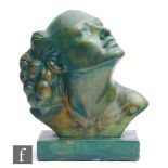 An Art Deco moulded plaster head and shoulder bust of a female in three quarter portrait gazing