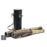 An early 20th Century three drawer telescope in canvas and leather case and a military brass
