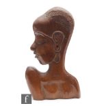 A carved wooden bust attributed to Hagenauer, modelled as a stylised African woman in profile with