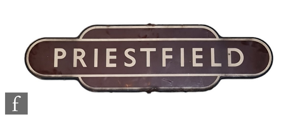 A railway totem sign for Priestfield, white lettering on brown background, 26cm x 92cm.