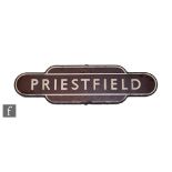 A railway totem sign for Priestfield, white lettering on brown background, 26cm x 92cm.