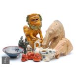 A collection of Asian items, to include to Chinese Tang Dynasty style pottery horse head figures,