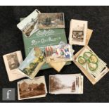 An Edwardian postcard album containing real photographic cards including images of the Enville