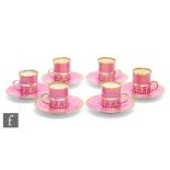 An early 20th Century Aynsley presentation cased set of six coffee cans and saucers in pink with a