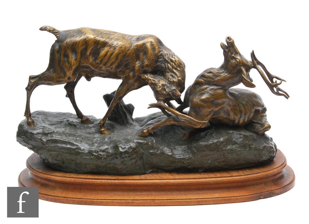 An early 20th Century patinated bronze group study of rutting stags, after Thomas Francois