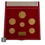 An Elizabeth II 1972 set of six 'The Royal Silver Wedding Coins' with ingot struck by the Franklin