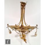A late 20th Century gilt metal light fitting, with five blue and white Wedgwood style roundels to