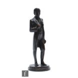 A 19th Century bronze figure of a politician, possibly Benjamin Franklin, standing wearing a