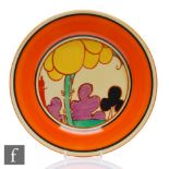 A large Clarice Cliff circular plate circa 1930, hand painted in the Summerhouse pattern with a