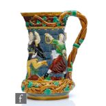 A late 19th Century Minton majolica 'Carnival Jester Tower' jug decorated in relief with dancing