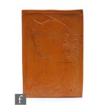 An early 20th Century cedar wood portrait plaque or panel of rectangular form, carved in shallow