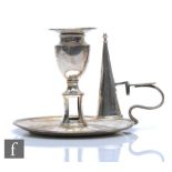 A Georgian hallmarked silver circular chamber stick of plain form with conforming sconce and