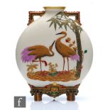 A late 19th Century Royal Worcester Aesthetic twin handled moon flask decorated in relief with two