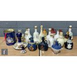 A large collection of assorted 20th Century decanters, mainly whisky to include Wade Bells