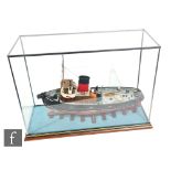 A contemporary scale model of a tug boat named Hilary Jeanes, modelled on the Irvine tug Garnock,