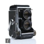 A Mamiya C3 camera, Twin-lens reflex medium format camera, with Mamiya-Sekor 80mm lens f.2.8 black