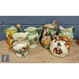 A collection of assorted 1930s and later novelty flower jugs to include a Burleigh Ware reproduction