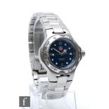 A lady's stainless steel quartz Tag Heuer Professional wrist watch with batons and date facility