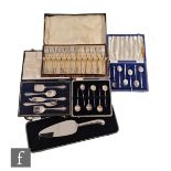 Four hallmarked silver cased items of flatware to include six foliate enamelled teaspoons, six