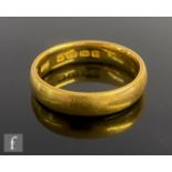 A 22ct hallmarked D shaped plain wedding ring, weight 6.5g, ring size P, Birmingham 1918.
