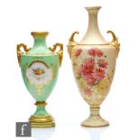 A Royal Worcester shape 1911 twin handled blush ivory vase decorated with sprays of flowers, green