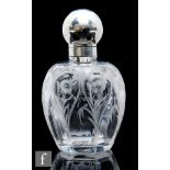 An early 20th Century Stevens & Williams clear crystal glass scent bottle, the shouldered ovoid body