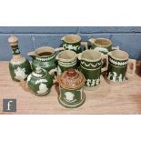 A collection of assorted late 19th Century Copeland (late Spode) olive green items with applied