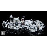 A collection of later 20th Century Swarovski glass birds and animals to comprise owl, parrot, quail,