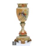 A Royal Worcester shape 1639 pedestal vase, the egg shaped body with a pierced rim edge decorated