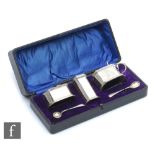 A cased hallmarked silver three piece cruet set of plain rectangular stepped form, weight 11oz (