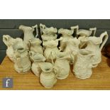 A collection of assorted 19th Century white salt glazed stoneware jugs of varying form and